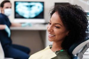 happy woman receiving dental fillings