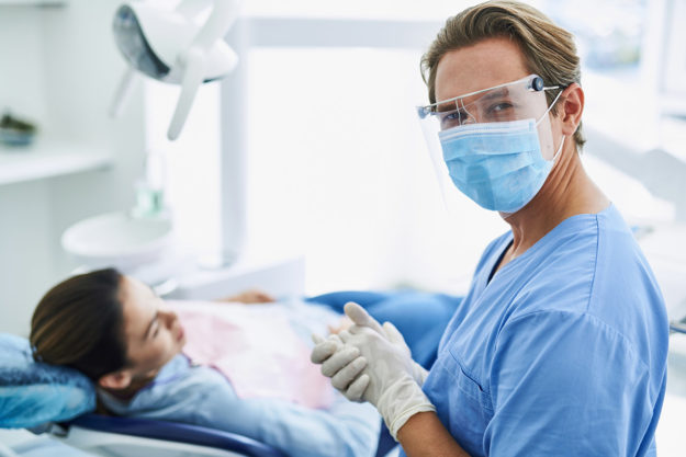 a woman getting help after realizing I have a dental emergency