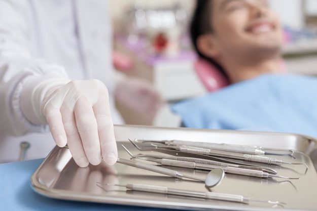 5 Signs You Need Dental Braces Again (3) adult patient getting dental braces