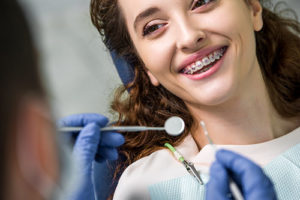 patient learning about specialty dental services